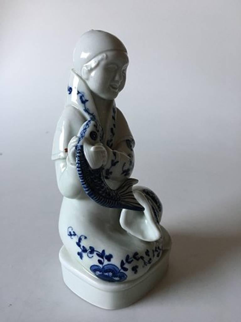 Royal Copenhagen Georg Thylstrup figurine of monk with fish. Measures 18cm and is in perfect condition.