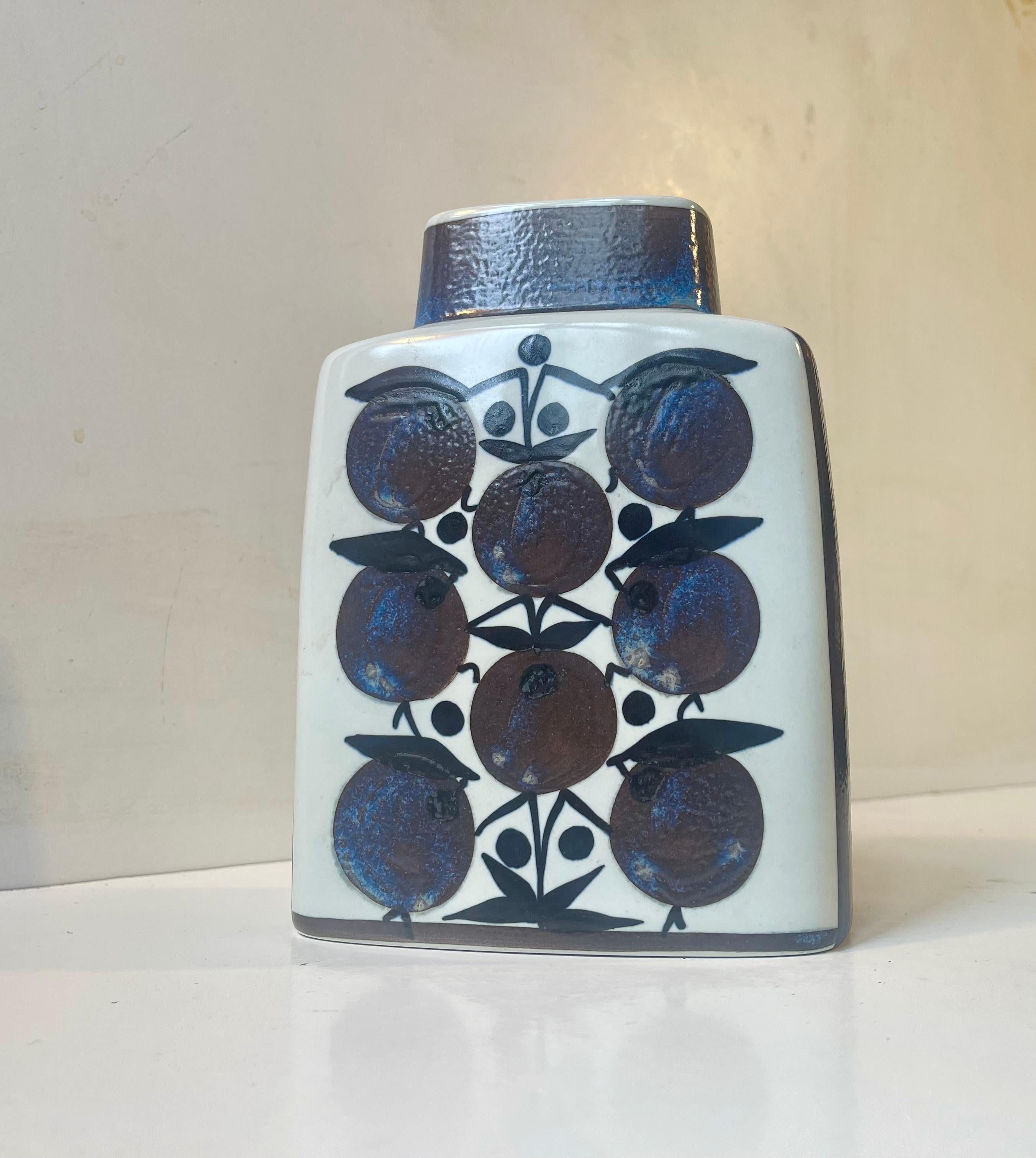 Royal Copenhagen Faience vase designed by Grethe Helland. Decorated with blue and purple glaze with blueberries as the main motif to both sides. Model number 441/3121 is also called Tenera and its fully marked to the base with designer initials and
