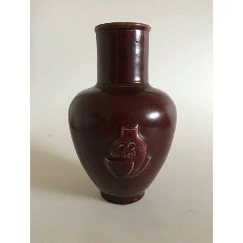 Royal Copenhagen Jais Nielsen Vase in Oxblood Glaze No 20247.

Measures 22.5cm and is in perfect condition.