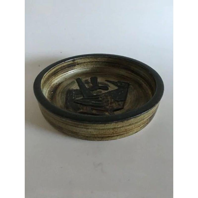 Royal Copenhagen Jorgen Mogensen stoneware bowl with bird no 21934.

Measures 30.7cm and is in perfect condition.