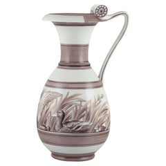 Royal Copenhagen. Large and rare antique pitcher. Overglaze. Unique work.