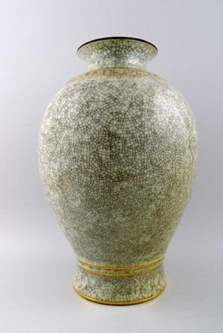 Royal Copenhagen. Large crackle porcelain vase no. 3200.
Height 36 cm.
1st. factory quality.
In perfect condition.