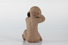 Royal Copenhagen Large Figurine by Terese Lucheschitz Jensen, Sitting boy 3425