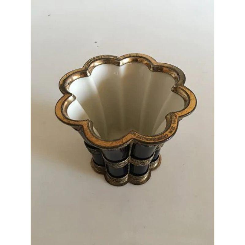 Royal Copenhagen Large Margrethe Cup with Sterling Silver Mounting by Anton Michelsen.

Measures 12cm 4 7/10