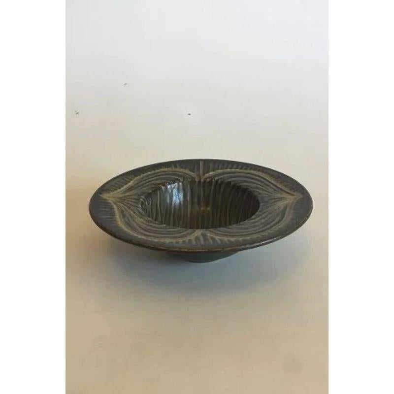 Royal Copenhagen little stoneware bowl

Designed by Gerd Bogelund. Measures 17.4 cm / 6 27/32 in. dia. x 5.1 cm / 2 1/64 in. high.