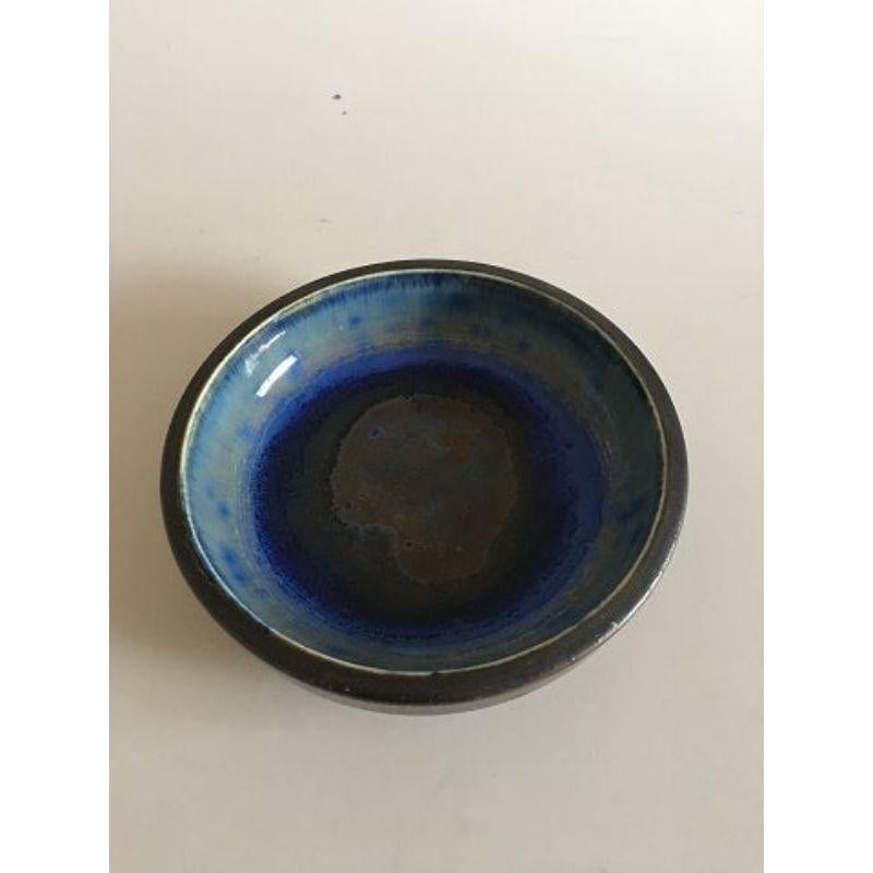 Royal Copenhagen Ludvigsen Bowl No 519 with Blue Crystalline Glaze

2nd Quality. 4.5 cm H (1 49/64