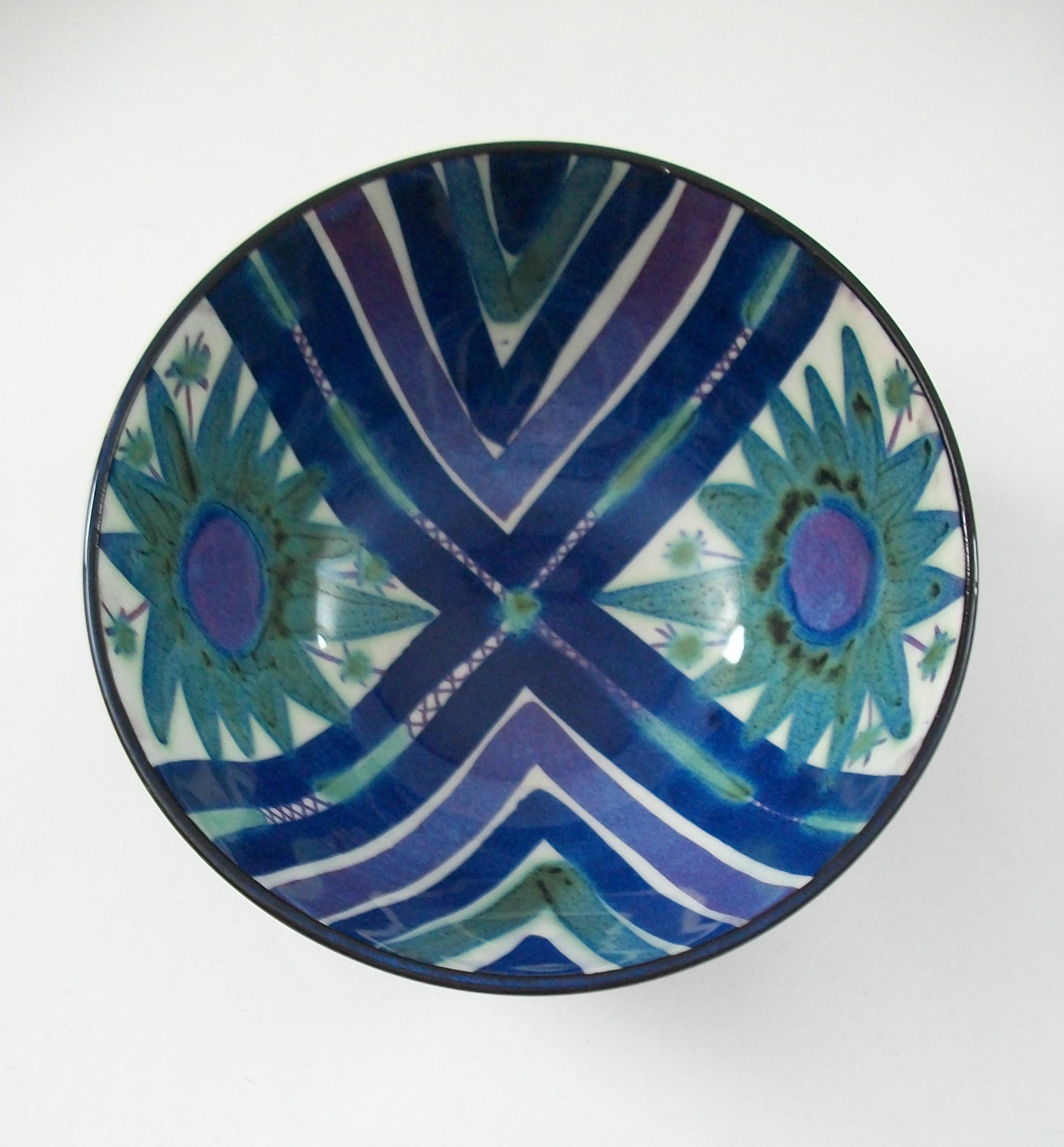 ROYAL COPENHAGEN (Manufacturer) - MARIANNE JOHNSON (Designer) - Mid Century fajance bowl - featuring a hand painted floral and chevron pattern to the interior of the bowl - hand painted blue exterior - signed on the base - Denmark - circa