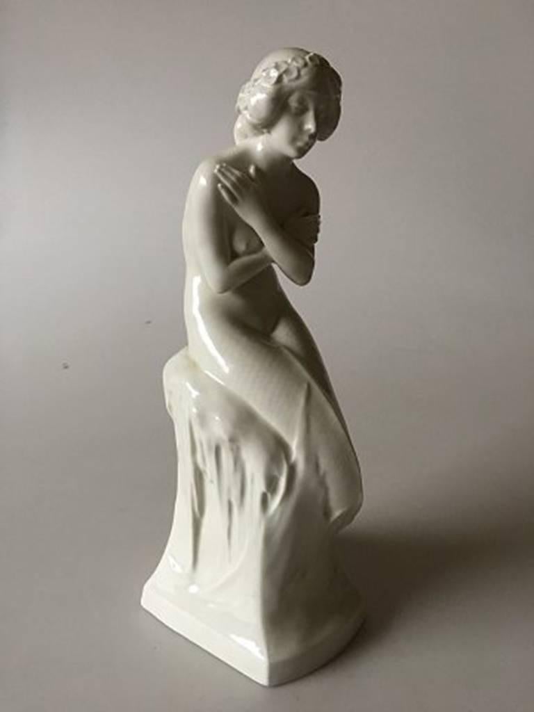 Royal Copenhagen mermaid on ice pedestal, white #1210. Designed by Christian Thomsen. 1st quality. In perfect condition. Measures: 26 x 10 cm.
