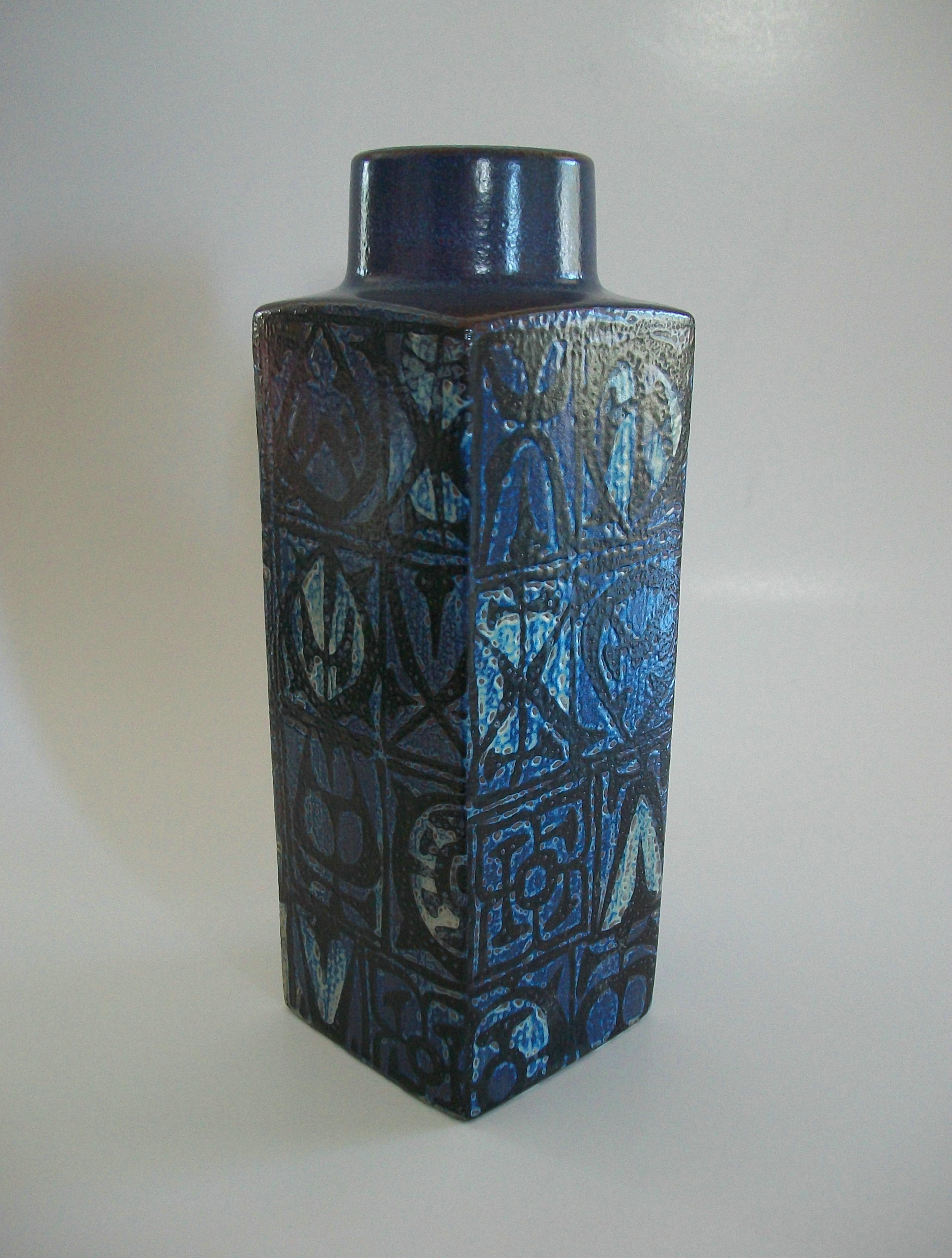 ROYAL COPENHAGEN (Manufacturer) - NILS THORSSON (Designer) - Mid Century 'Baca' series fajance vase - featuring a black and blue abstract pattern to all four sides - blue glazed neck and rim - textured finish - signed on the base - Denmark - circa