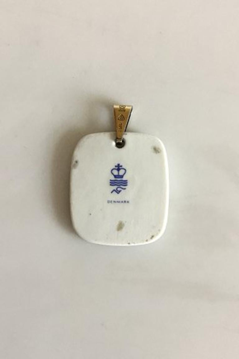 Royal Copenhagen Nils Thorsson Porcelain Pendant. Measures 3.5 / 1 3/8 in. x 3 cm / 1 7/64 in.