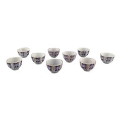 Royal Copenhagen, Nine Antique and Rare Cups in Hand Painted Porcelain