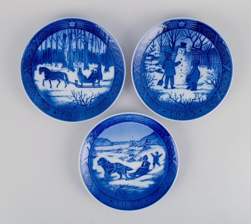 Hand-Painted Royal Copenhagen, nine Christmas plates in porcelain. For Sale