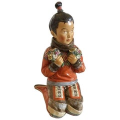 Royal Copenhagen Over-Glaze Figurine Greenland Girl #12415