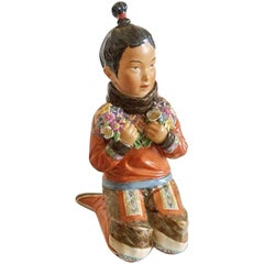 Royal Copenhagen Over-Glaze Figurine Greenland Girl #12415