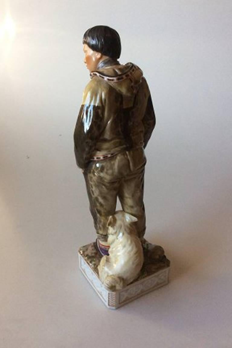 Royal Copenhagen overglaze figurine of Greenland man no 12225.

Measures 32cm / 12 3/5 in.

1st quality and in perfect condition.