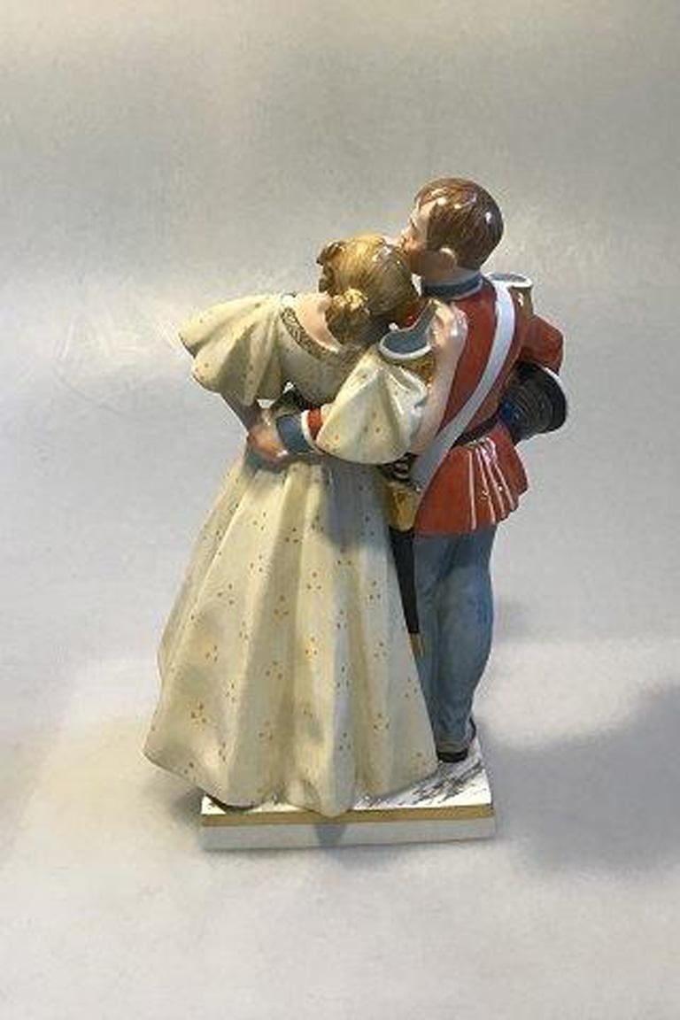 Royal Copenhagen overglaze figurine soldier and princess no 1180 

Measures H 18.5 cm. 

Design by Christian Thomsen.