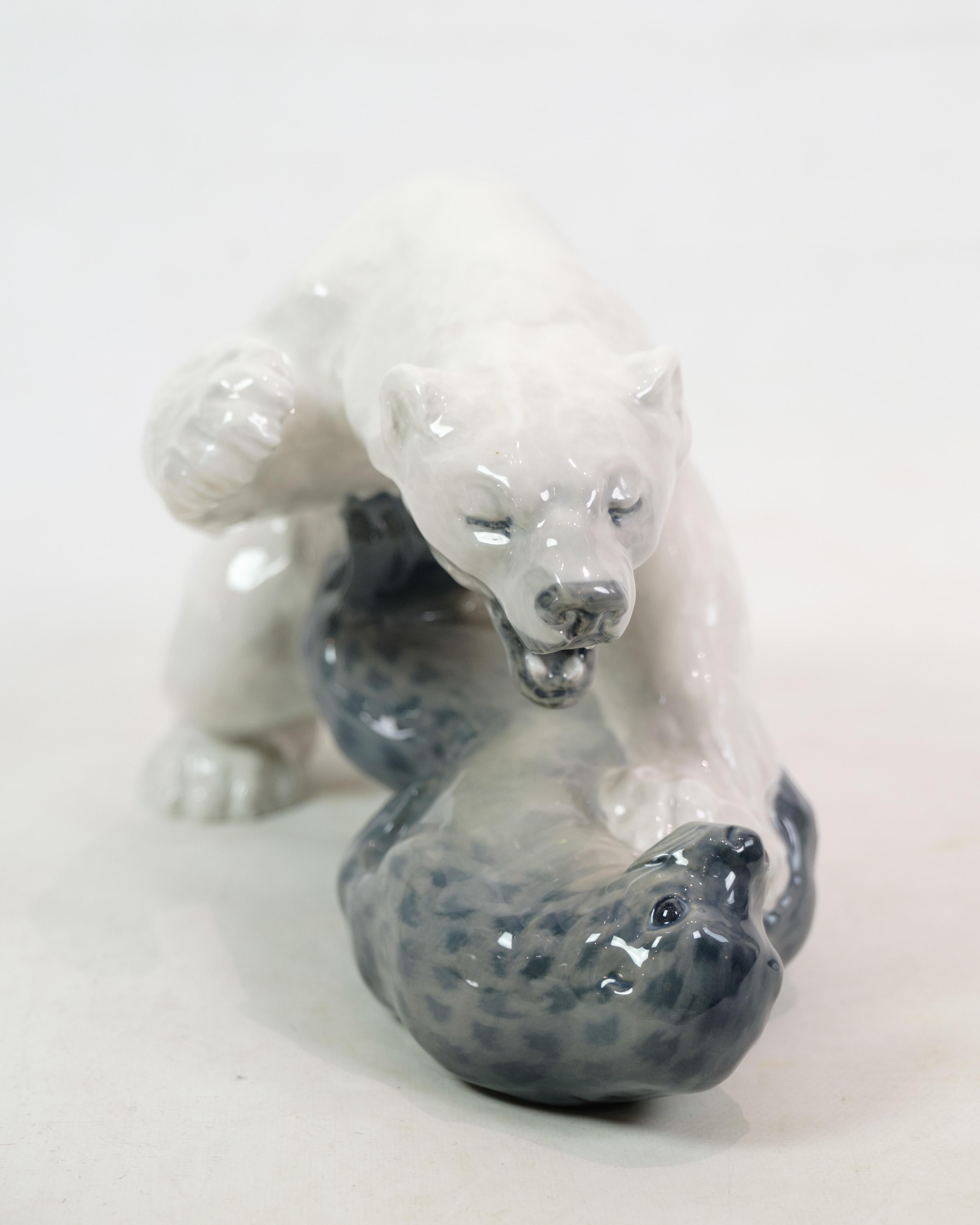 This beautiful porcelain figure of a polar bear and a seal is a fantastic example of Royal Copenhagen's Fine craftsmanship. Figure no. 1108 was designed by Knud Kyhn in 1909 and is a true Classic from Royal Copenhagen's collection.

Figure no.