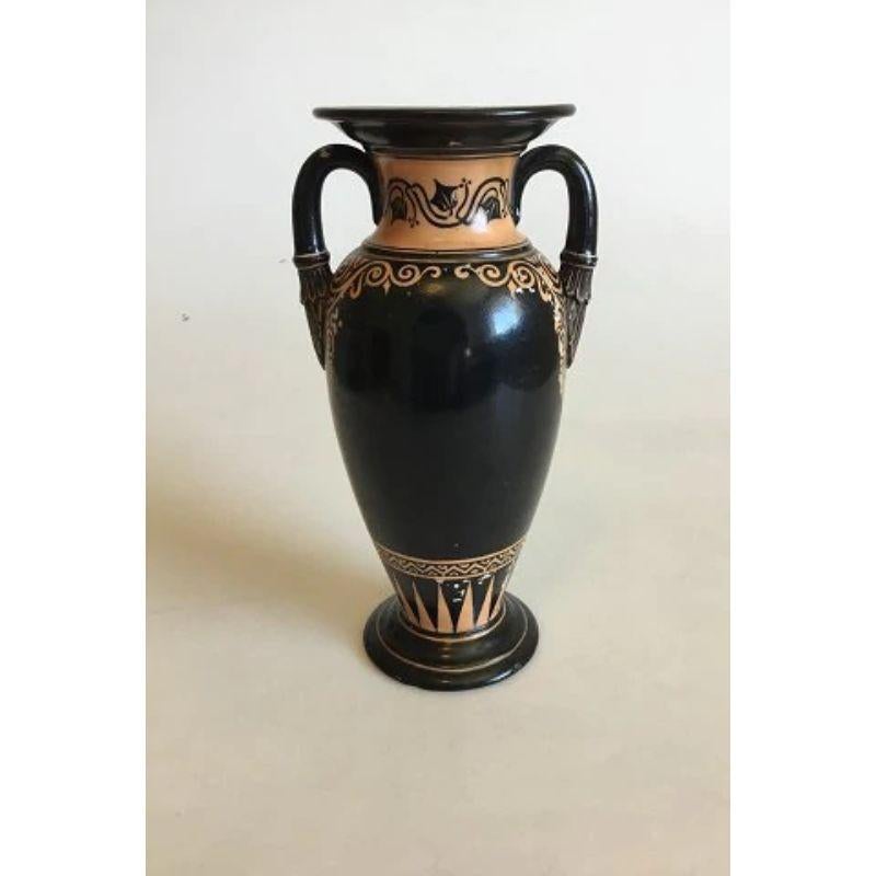 Royal Copenhagen Porcelain Amphora Vase with Handles

Measures 20 cm / 7 7/8