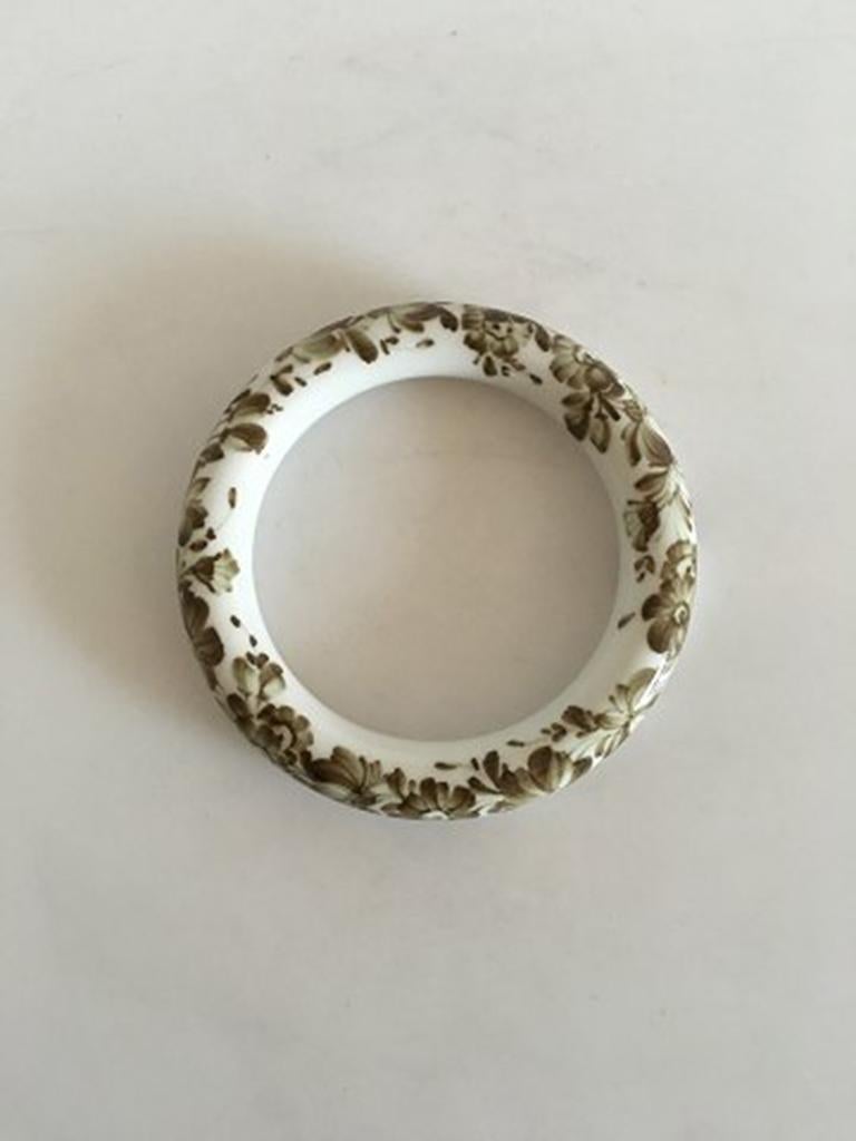 Royal Copenhagen Porcelain Bangle Bracelet with Flowers. 6.5 cm inner measurement (2 9/16 in). In fine condition.