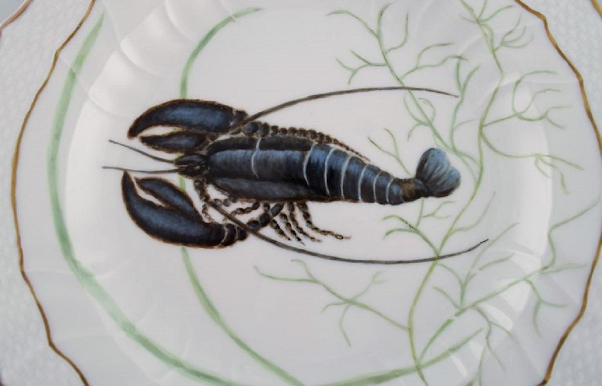 Royal Copenhagen porcelain dinner plate with hand-painted crayfish motif and golden border. Flora / Fauna Danica style. Dated 1968.
Diameter: 25.5 cm.
In excellent condition.
Stamped.
3rd factory quality.