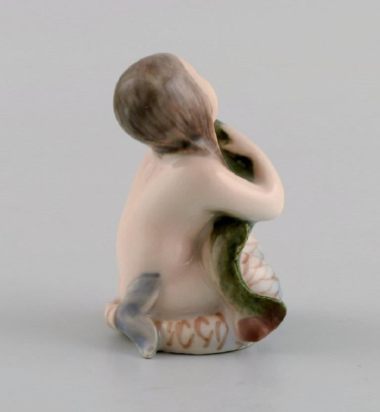 Glazed Royal Copenhagen Porcelain Figure, Little Mermaid with Fish, Model Number 2348
