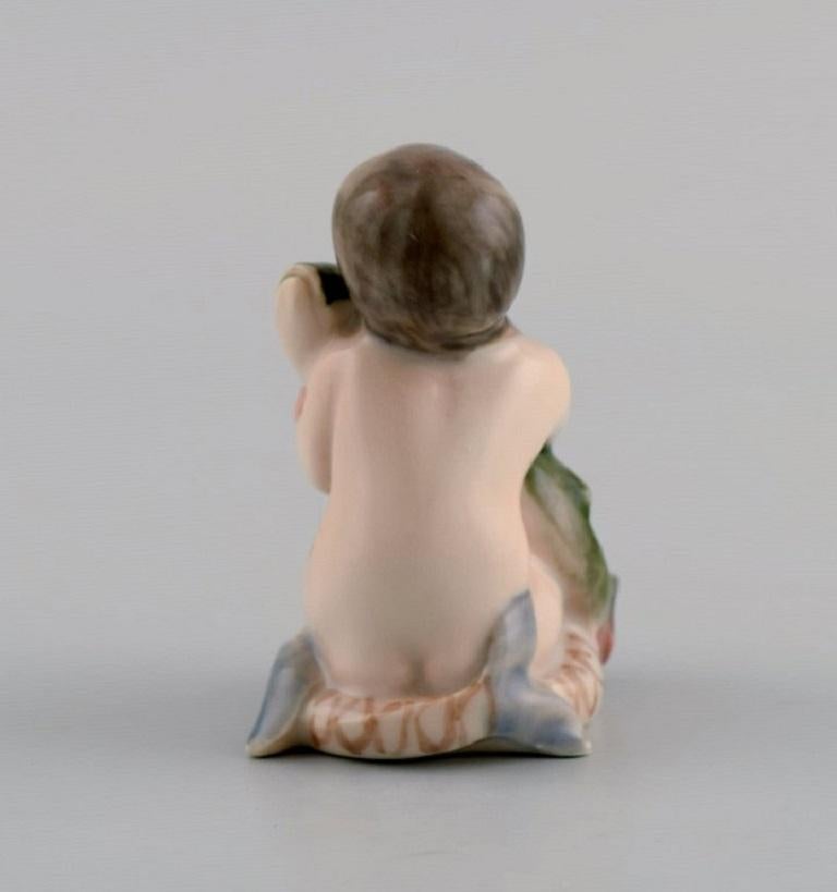 20th Century Royal Copenhagen Porcelain Figure, Little Mermaid with Fish, Model Number 2348