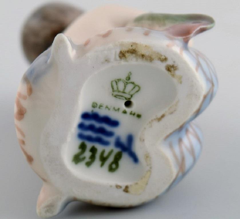 Royal Copenhagen Porcelain Figure, Little Mermaid with Fish, Model Number 2348 1
