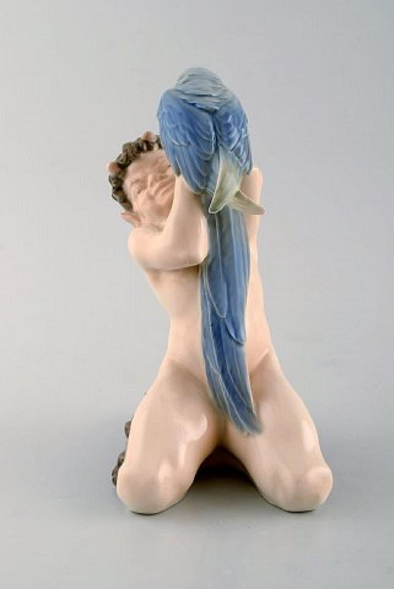 Royal Copenhagen porcelain figurine. Faun with a parrot. Model Number: 752.
Measures: 19 x 12 cm.
In very good condition.
Stamped.
1st factory quality.