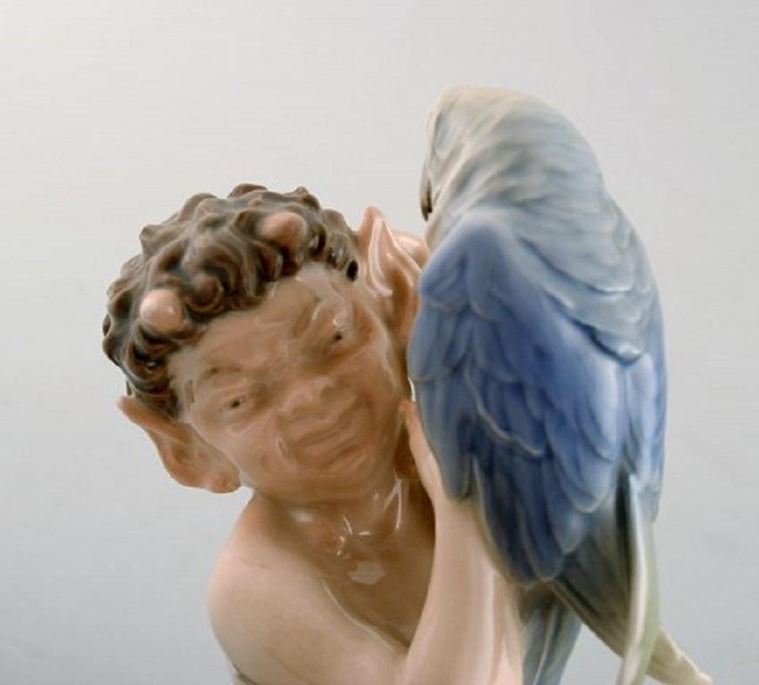 Royal Copenhagen Porcelain Figurine, Faun with Parrot, Model Number 752 1