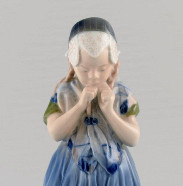 Royal Copenhagen porcelain figurine. Girl from Bornholm. Model number 1323.
Measures: 20.5 x 11 cm.
In excellent condition.
Stamped.
1st factory quality.