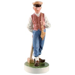 Royal Copenhagen Porcelain Figurine in High Quality over Glaze, Farmer Boy