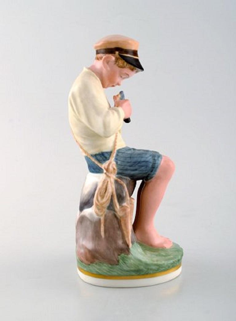 Danish Royal Copenhagen Porcelain Figurine in High Quality over Glaze, Young Boy For Sale