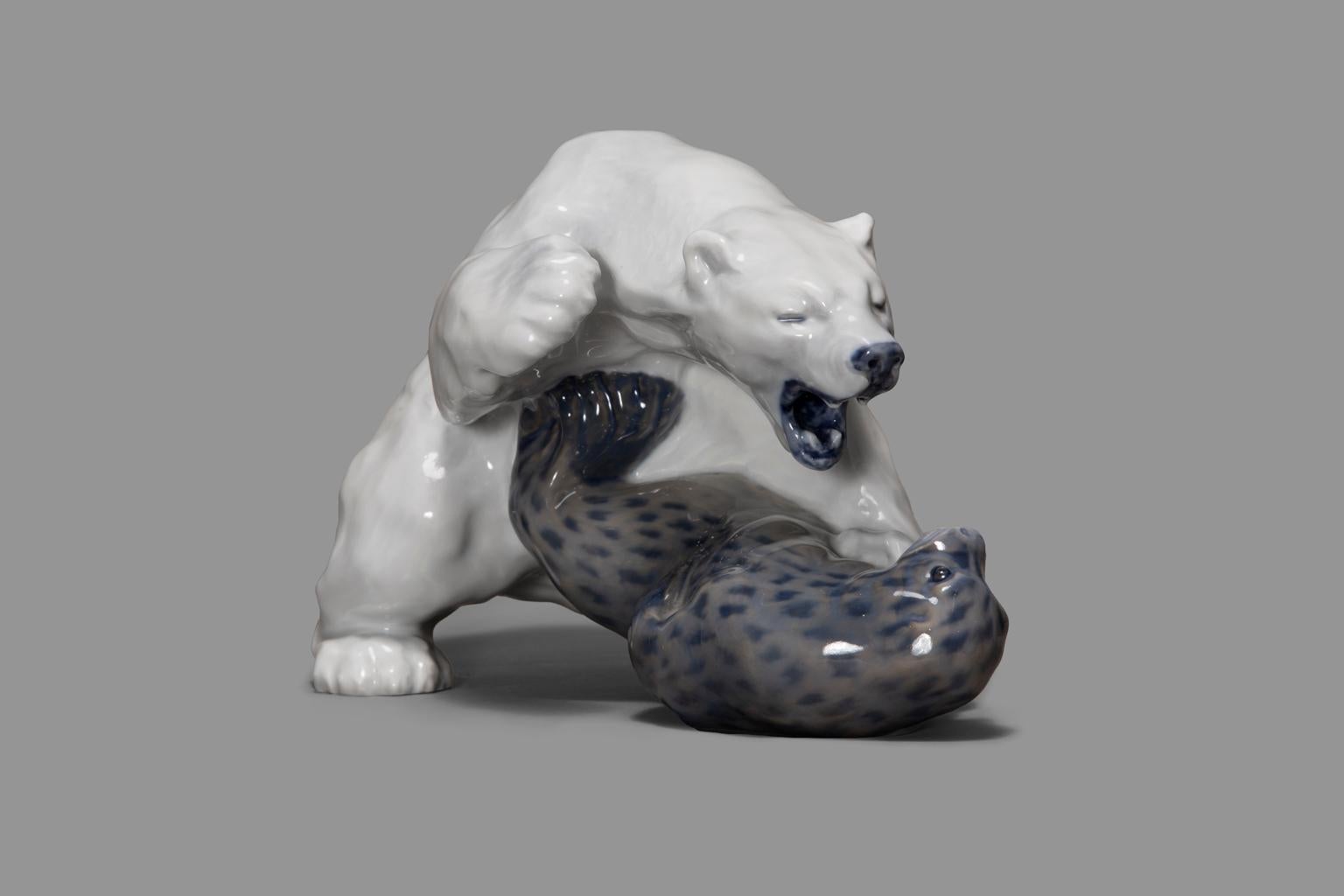Royal Copenhagen's Polar Bear and Seal were designed by Knud Carl Edvard Kyhn around 1908/9 and has been a popular porcelain figurine #1108.

Knud Carl Edvard Kahn (1880 - 1969) was a Danish painter, draftsman and ceramic sculptor. He was the nephew