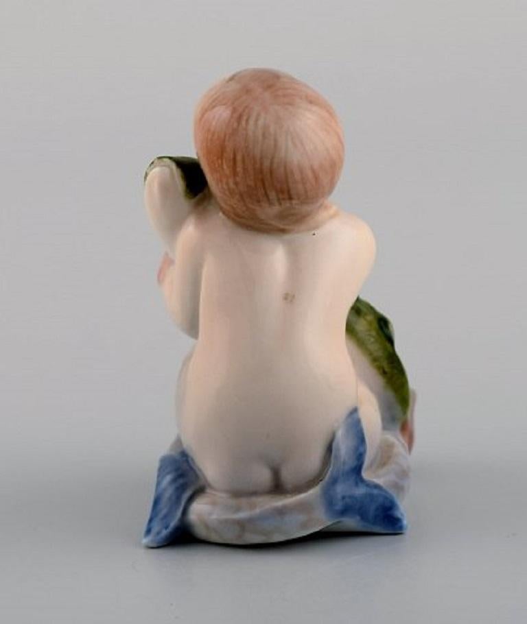 Early 20th Century Royal Copenhagen Porcelain Figurine, Mermaid with a Fish, 1920s