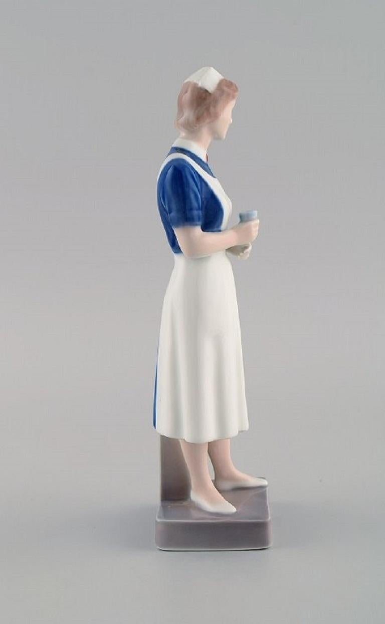Danish Royal Copenhagen Porcelain Figurine, Nurse, Dated 1969-1974 For Sale