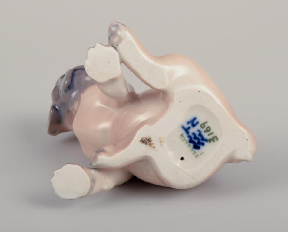 Royal Copenhagen, porcelain figurine of a Boxer puppy. Ca 1930s For Sale 1
