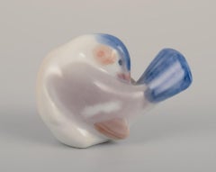 Royal Copenhagen porcelain figurine of a finch. Approximately from 1930.