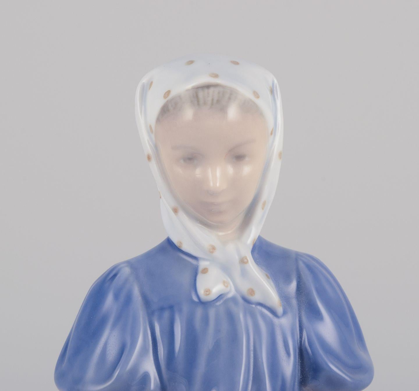 Royal Copenhagen, porcelain figurine of a girl with goose. Danés en venta