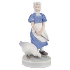 Royal Copenhagen, porcelain figurine of a girl with goose.