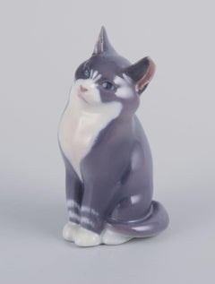 Royal Copenhagen. Porcelain figurine of a sitting cat.