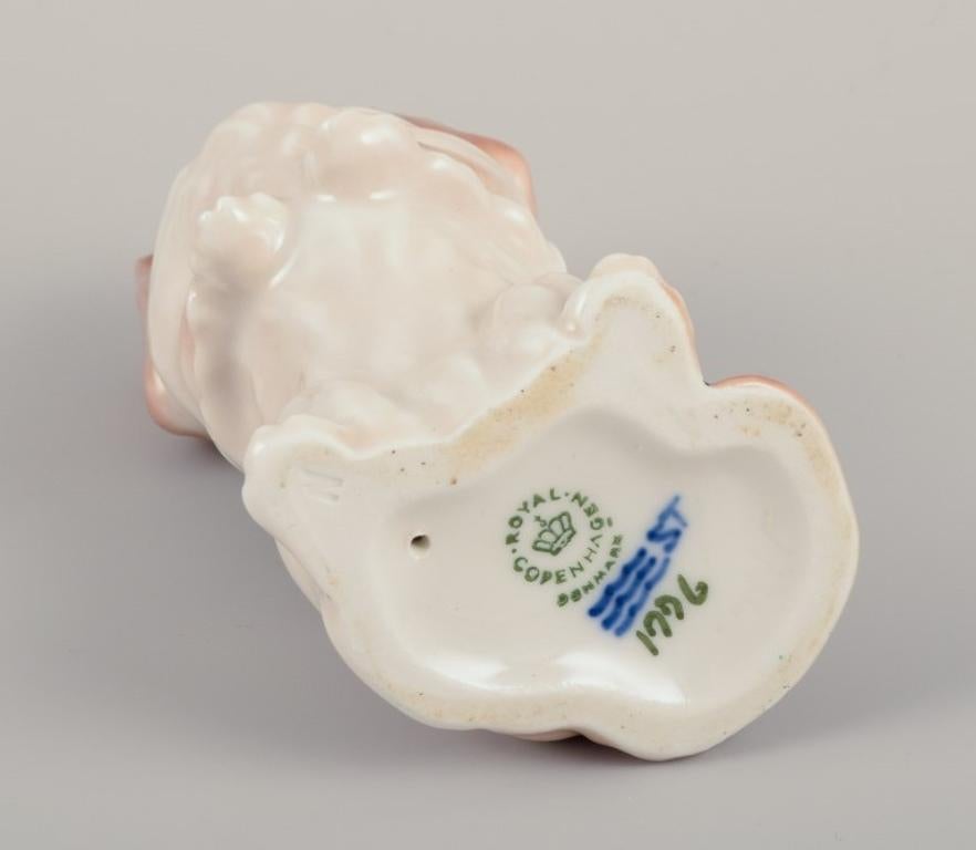 Royal Copenhagen, porcelain figurine of a standing Pekingese. 1