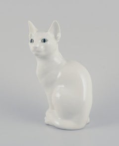 Royal Copenhagen. Porcelain figurine of a white Siamese cat.