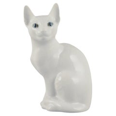 Royal Copenhagen. Porcelain figurine of a white Siamese cat.