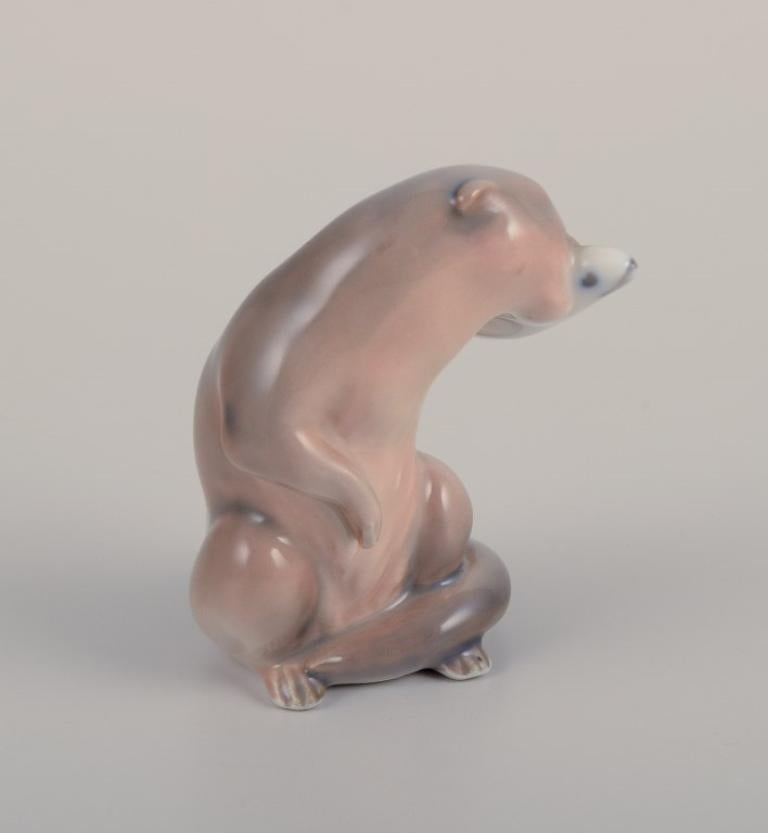 Royal Copenhagen, a porcelain figurine of an otter with a fish in its mouth.
Model number 2333.
Approximately from 1930.
Marked.
Perfect condition.
First factory quality.
Dimensions: W 4.0 cm x H 5.0 cm.