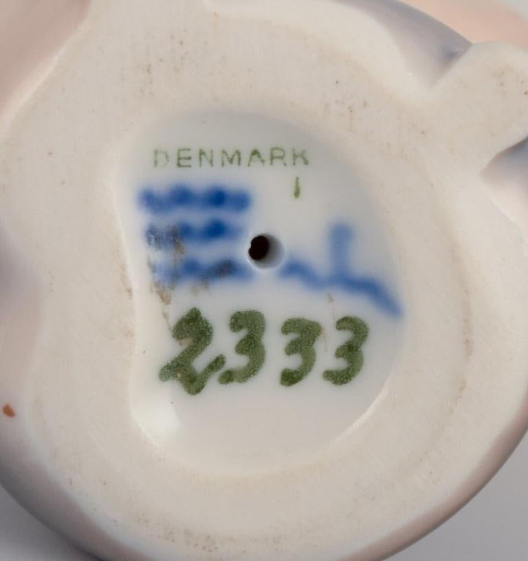 Royal Copenhagen, porcelain figurine of an otter with a fish in its mouth 1