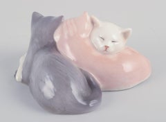 Royal Copenhagen. Porcelain figurine of three sleeping kittens.
