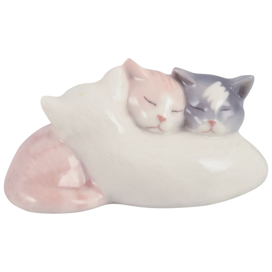 Royal Copenhagen. Porcelain figurine of three sleeping kittens.