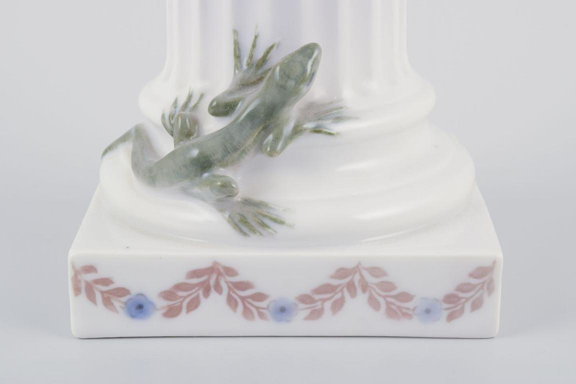 Danish Royal Copenhagen, porcelain figurine. Whistling Pan sitting on a pedestal. For Sale