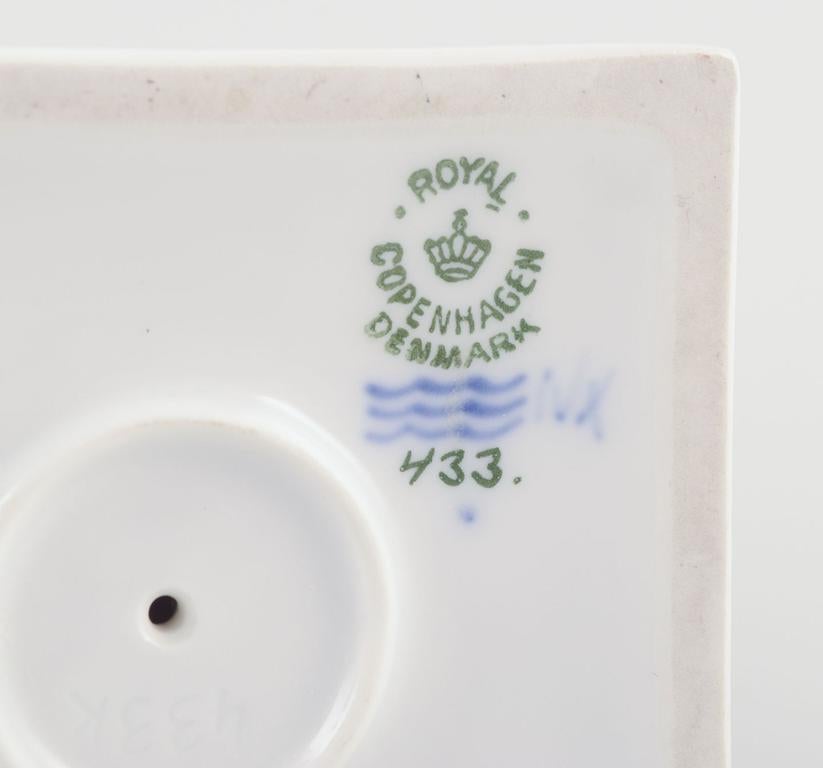 Royal Copenhagen, porcelain figurine. Whistling Pan sitting on a pedestal. For Sale 2