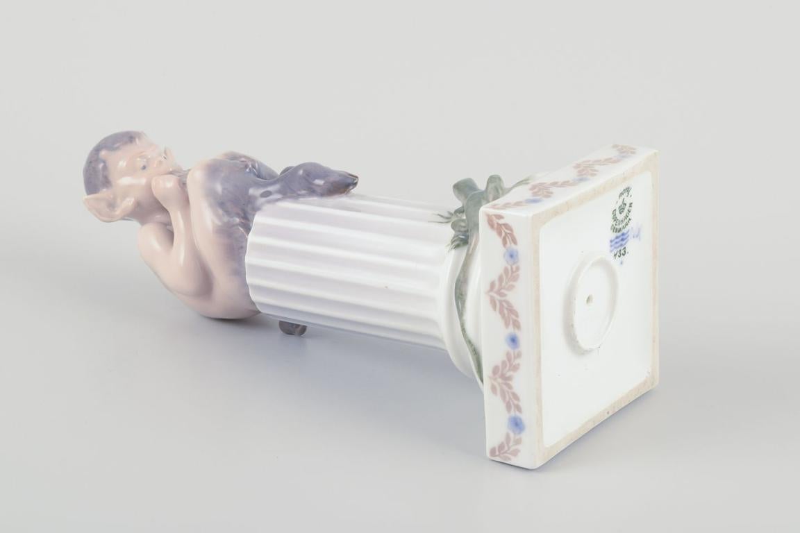 Royal Copenhagen, porcelain figurine. Whistling Pan sitting on a pedestal. For Sale 3